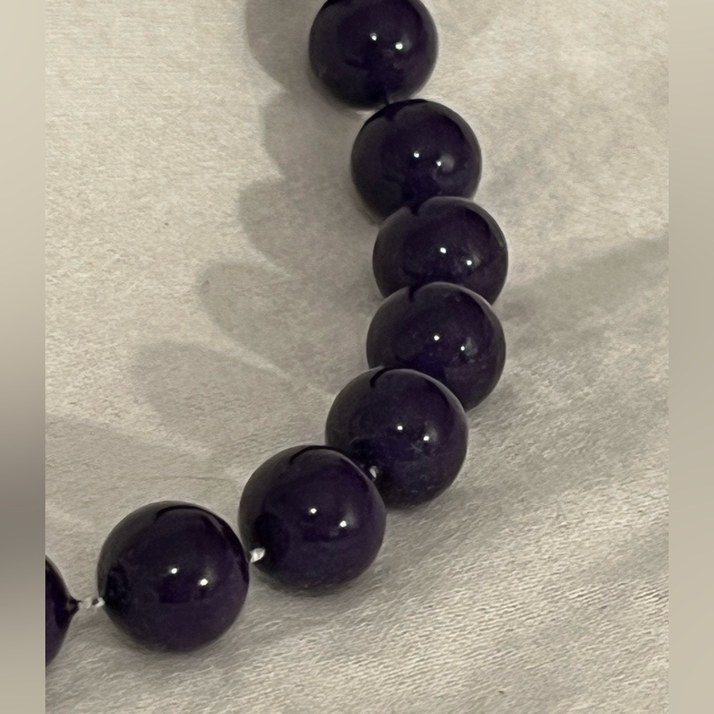 Long vintage purple beaded necklace.